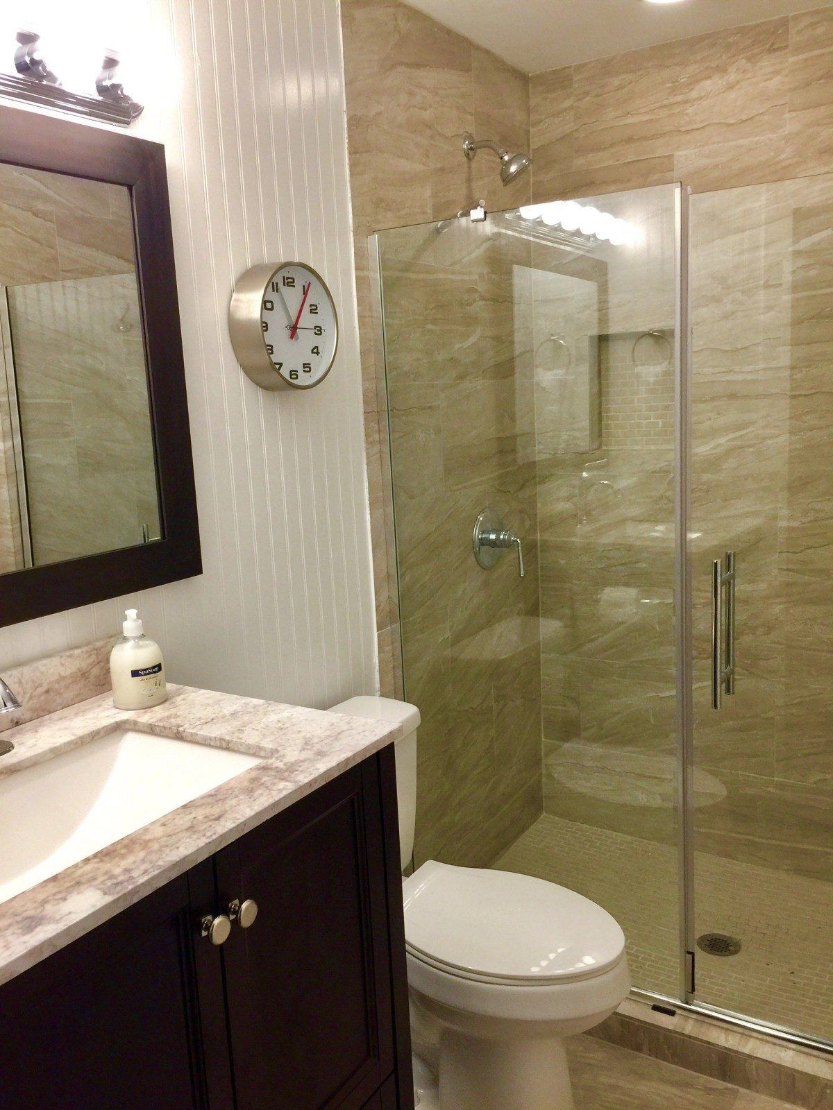 Remodeled bathroom with a walk-in shower