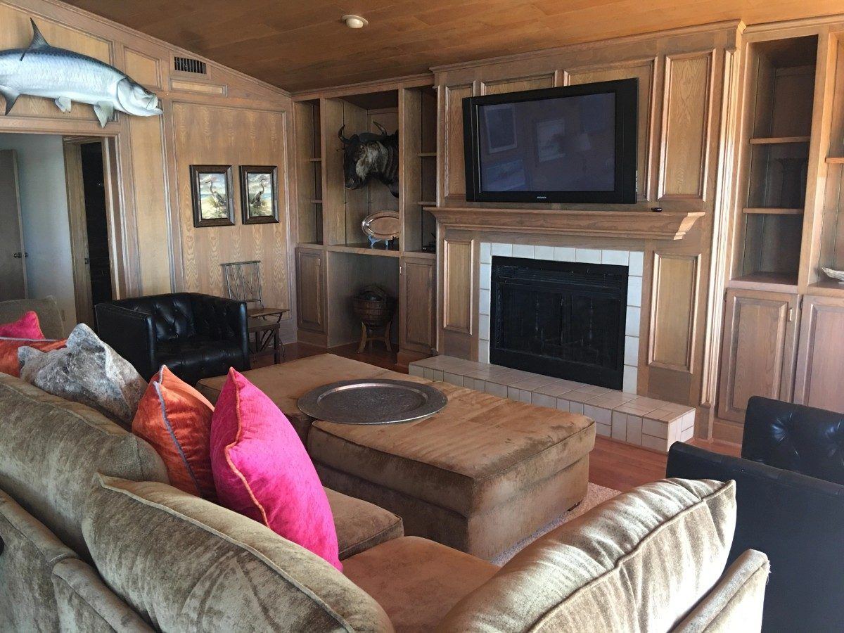 Living room and gathering space with fireplace