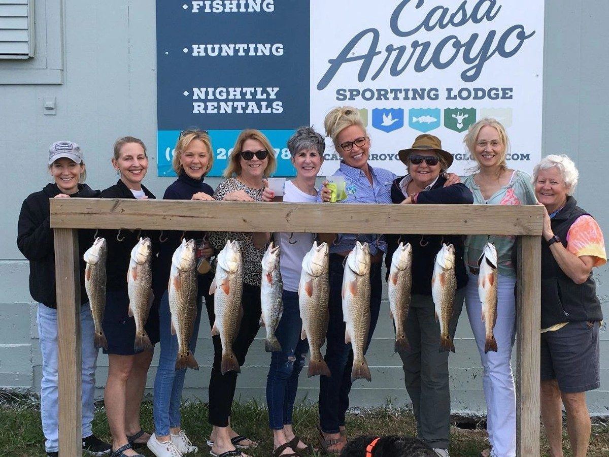 Guests on the dock with the day's catch