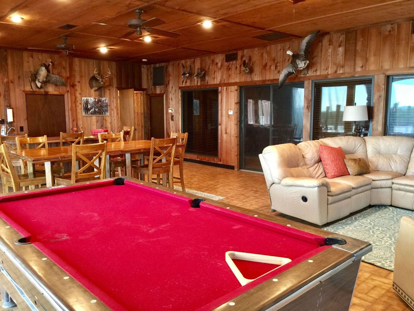 First Floor — great room with the pool table and dining tables