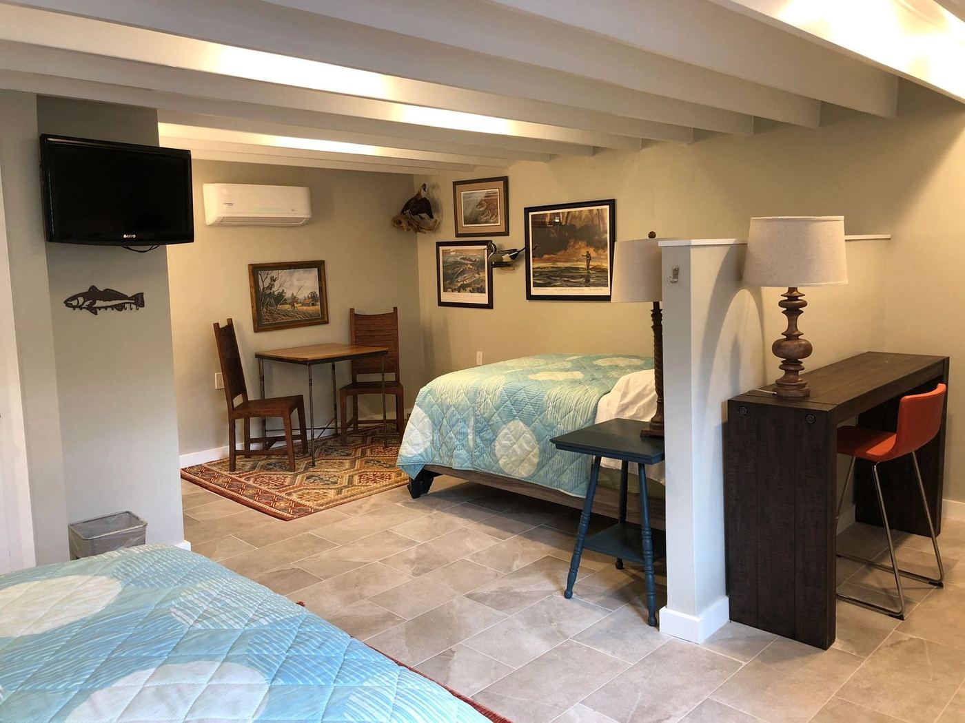 The Casita — sitting area, desk and two full beds