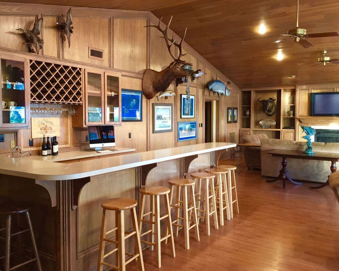Upper Level — the bar with wine storage and South Texas mounts