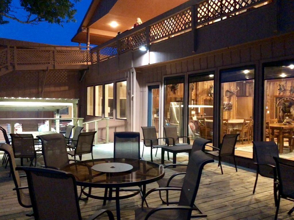 The lodge patio lit up after dark